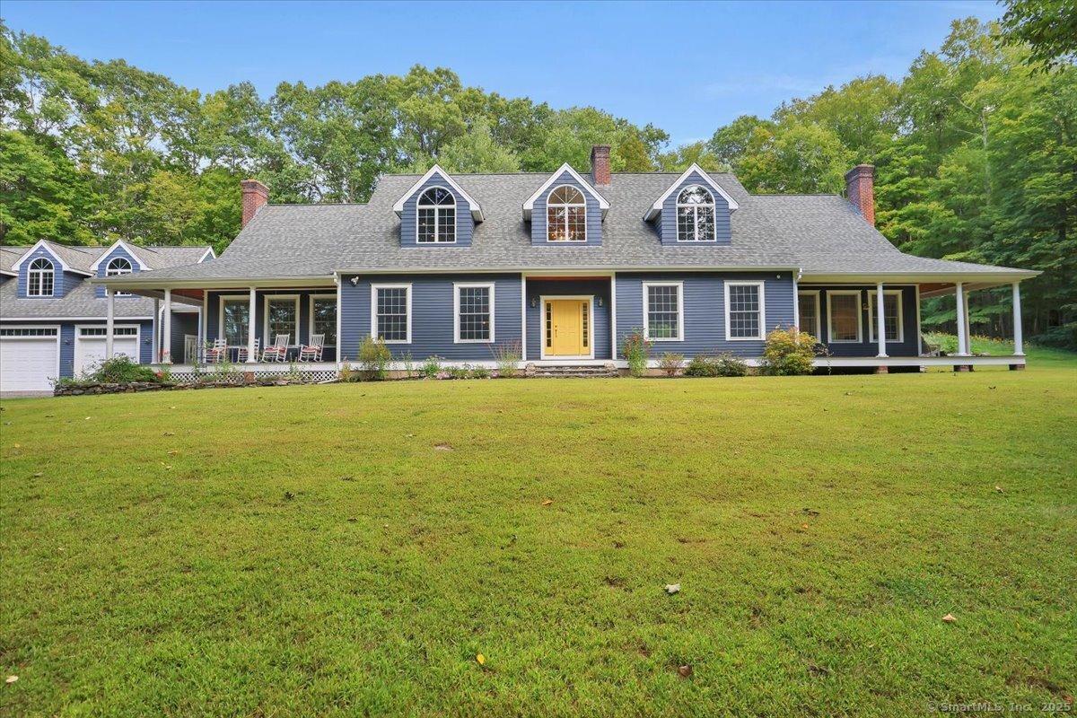 Image 2Front of House: There is a primary bedroom suite on the main floor and another primary bedroom suite on the upper level. There are 2 other bedrooms on the upper level along with another full bathroom.