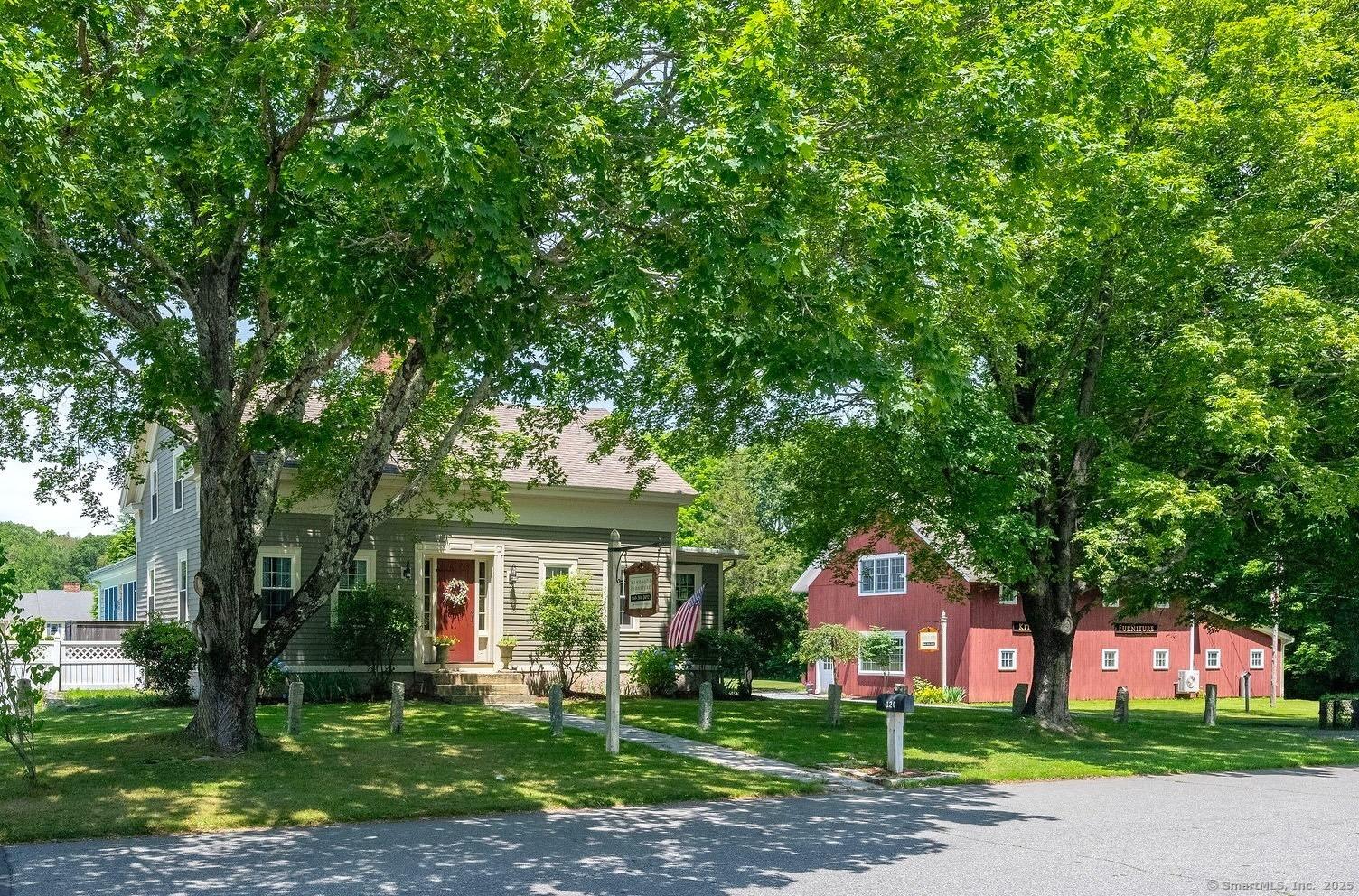 Image 2: updated, antique home with multi-use barn