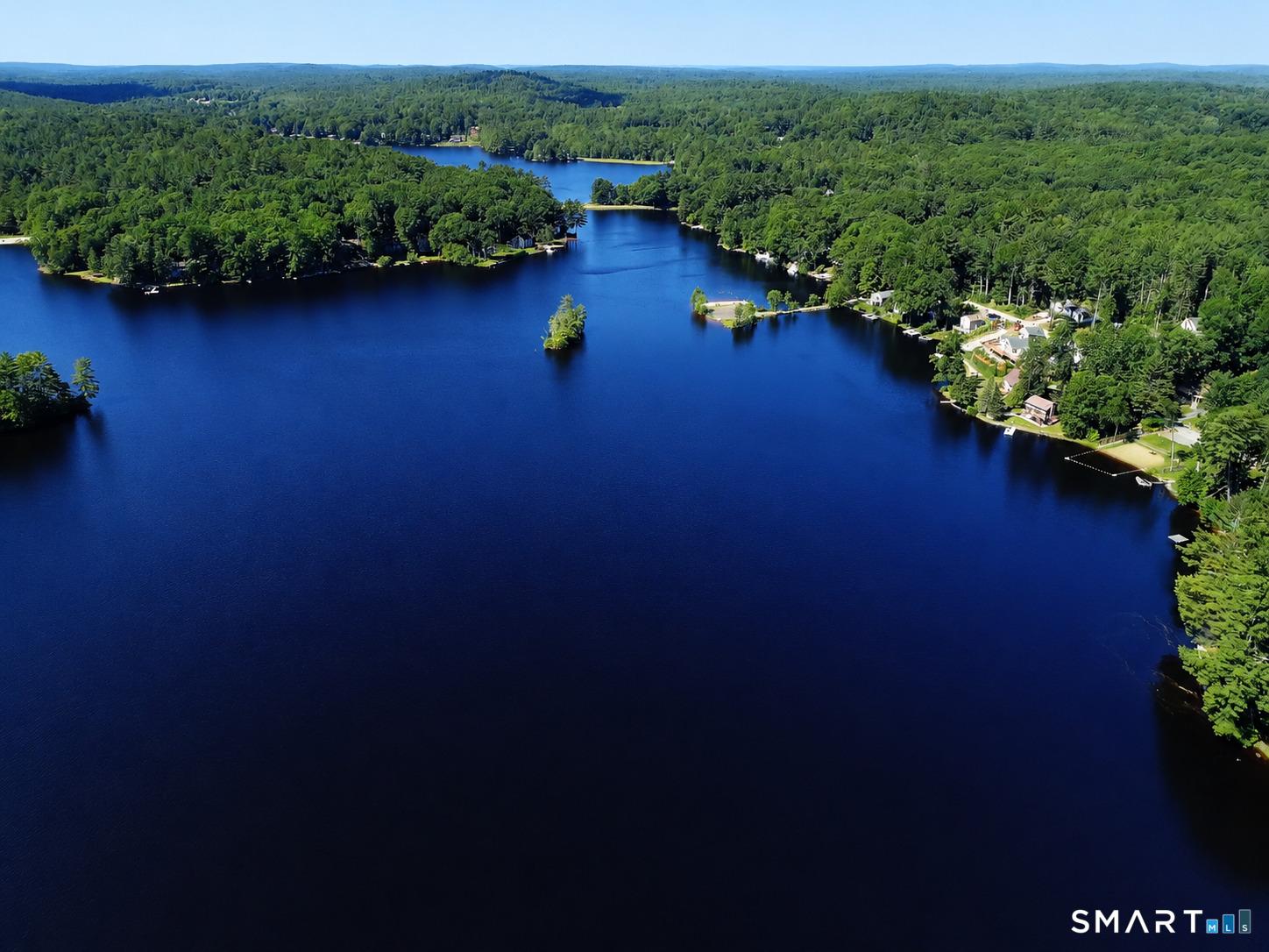 Image 2Lake: This property also includes coveted Lake Bunggee rights, offering year-round recreation on a private 111-acre lake community with 2 boat launches and 5 beaches. Enjoy boating, waterskiing, fishing, swimming, and more