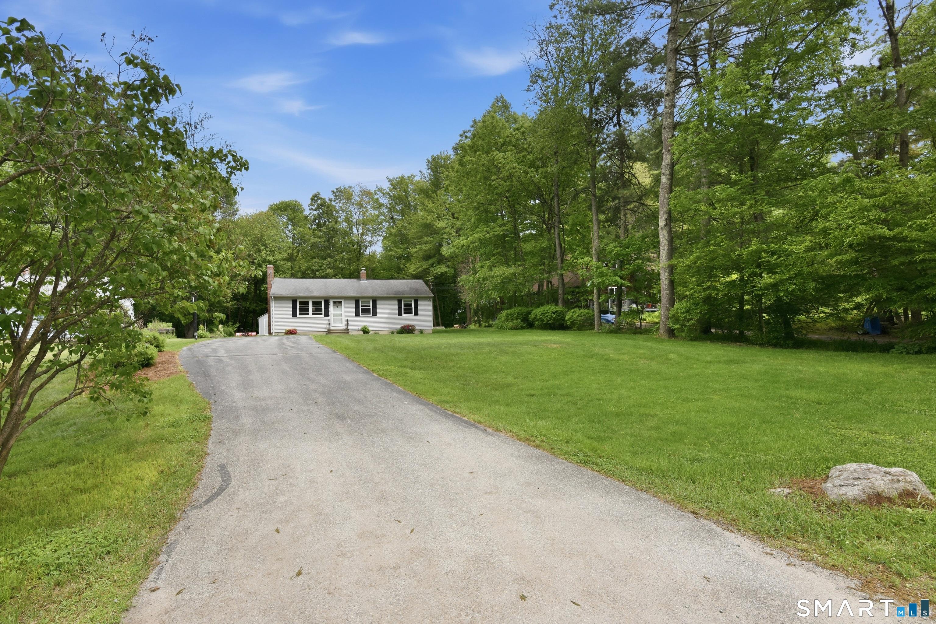 Image 3Front of House: Long Paved Driveway. Nicely Set Back from the Road