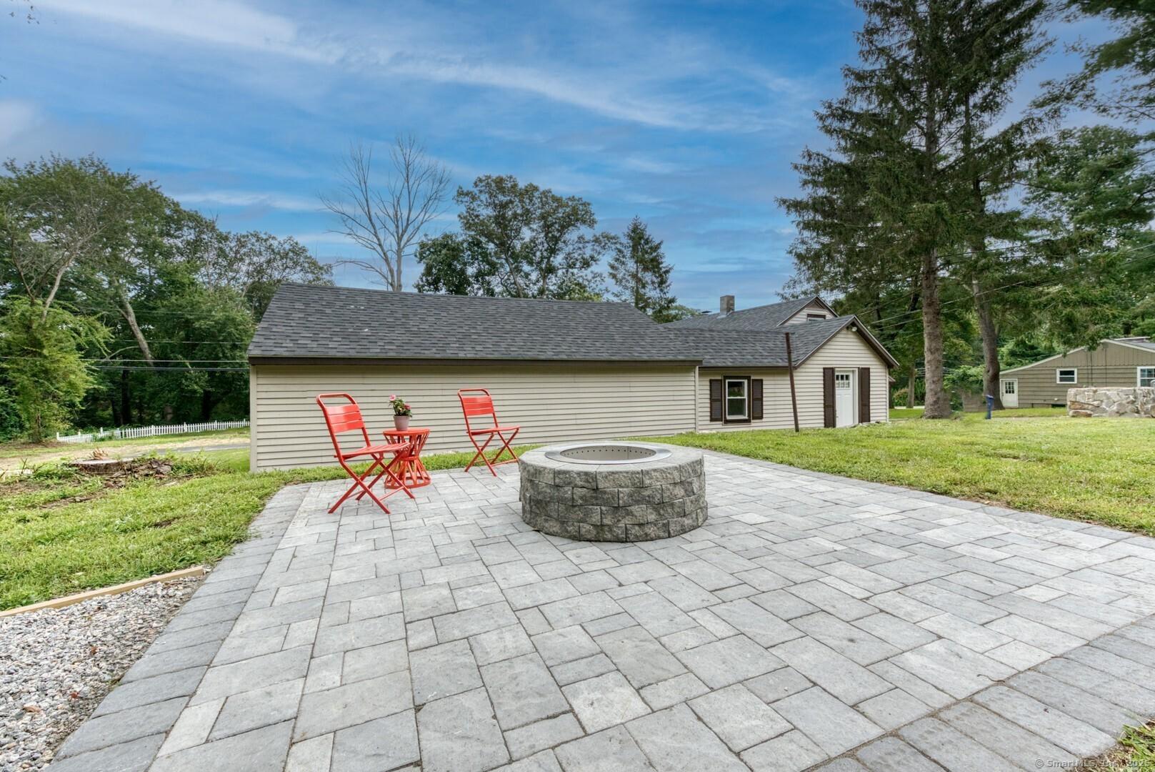 Image 2: rear patio and firepit