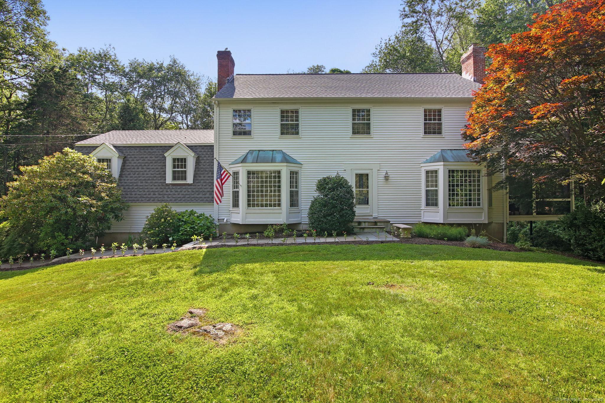 Image 1: Ideally sited on two level acres. Envious property!