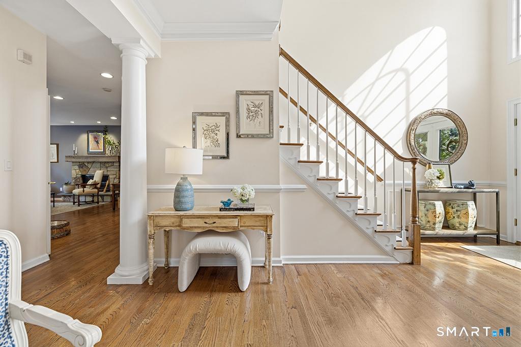 Image 3: Hardwood floors throughout the first floor are pristine