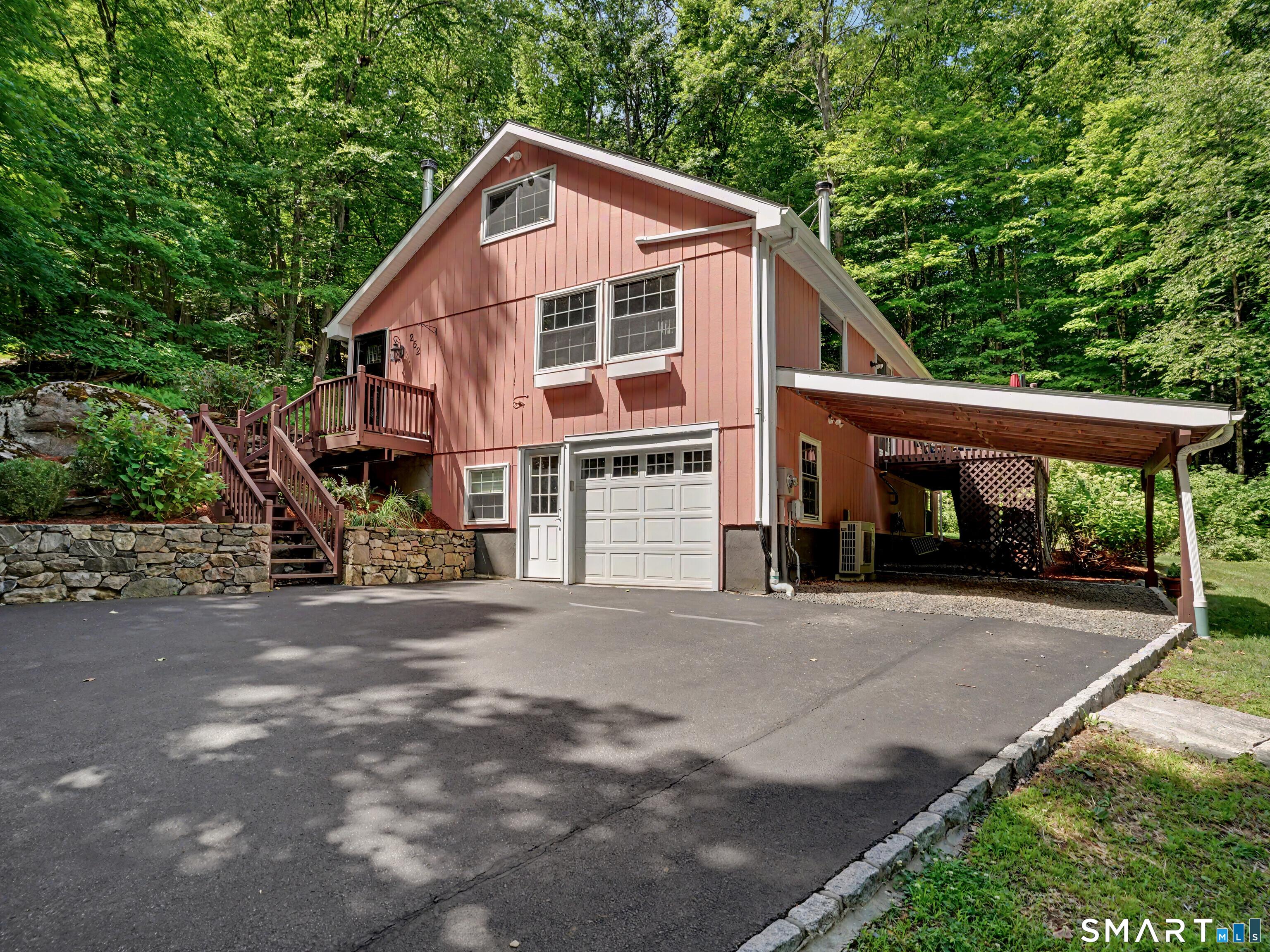 Image 1: Welcome to 252 Bennetts Farm Road, where peace & privacy converge in a beautiful natural setting.
