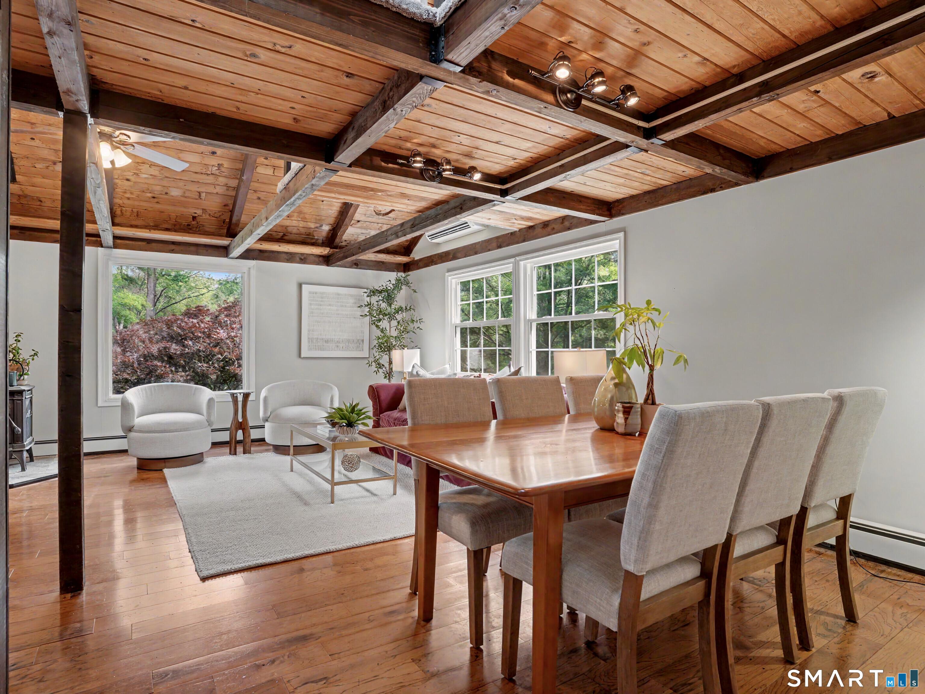 Image 4: And, continues into the spacious Living Room