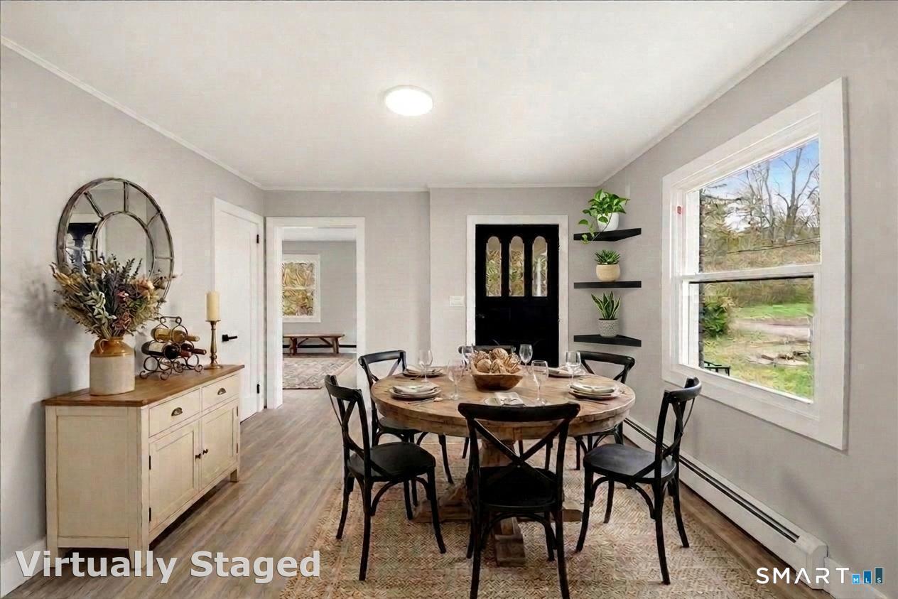 Image 4Dining Area: Entry on main floor into dining area.
