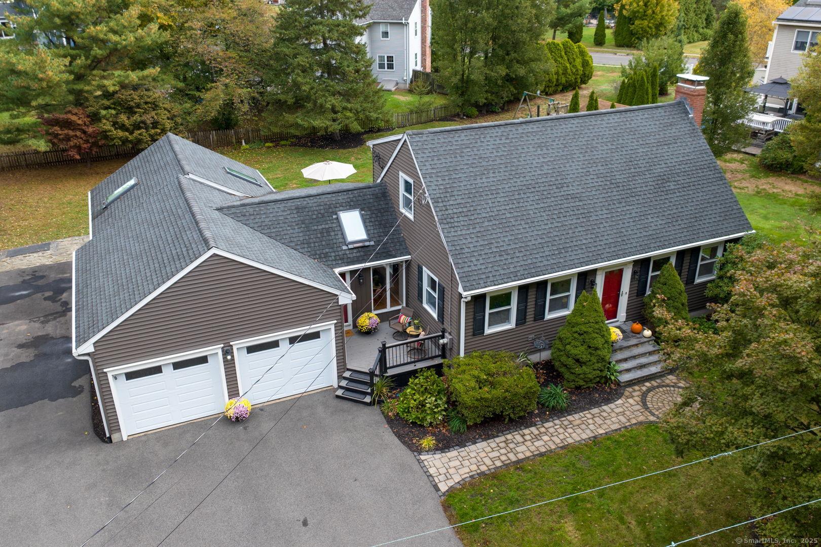 Image 2Aerial View: Aerial view of the front of the home showcasing newer 50 year roof.