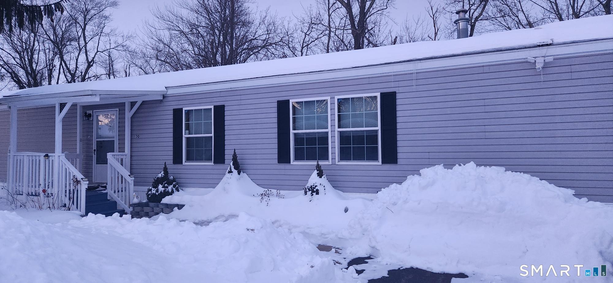 Image 1Front of House: Front with covered front porch.