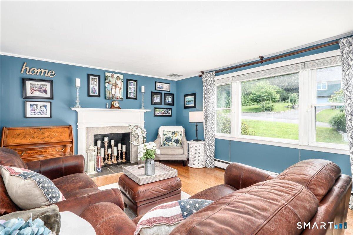 Image 4Living Room: Wood burning fireplace adds warmth and ambience