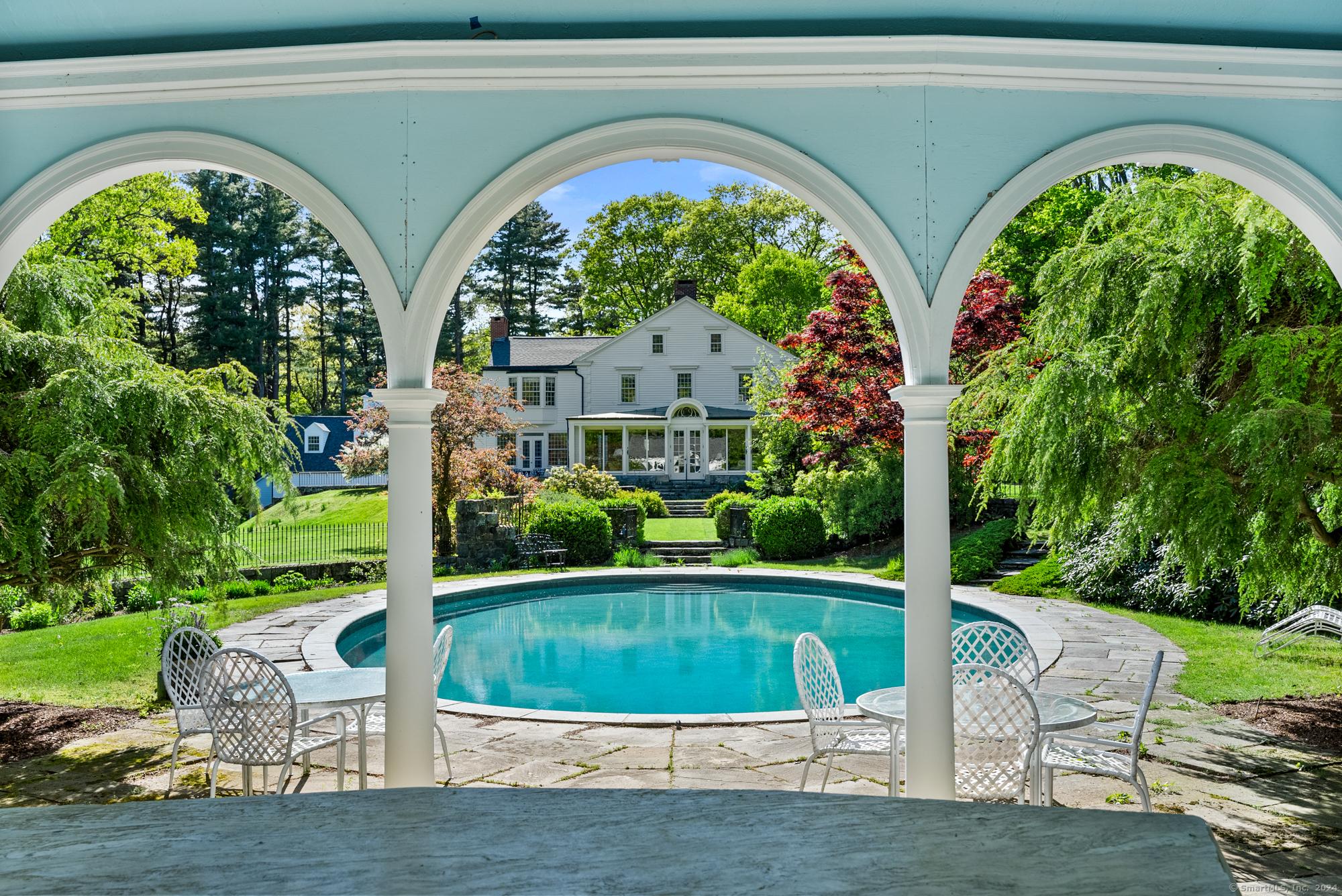 Image 1Swimming Pool: View from pool cabana to house