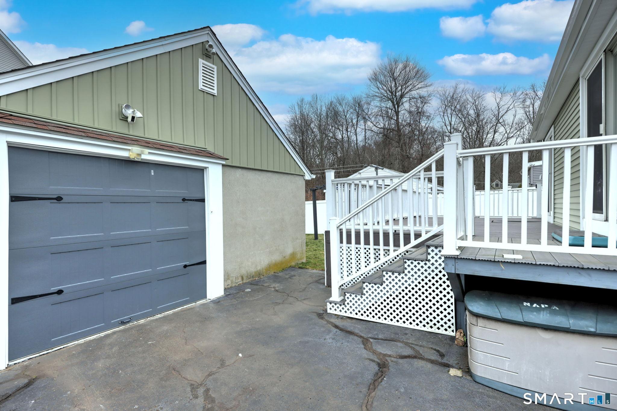 Image 3Garage: 1.5 Heated Garage with new door and additional storage above 
