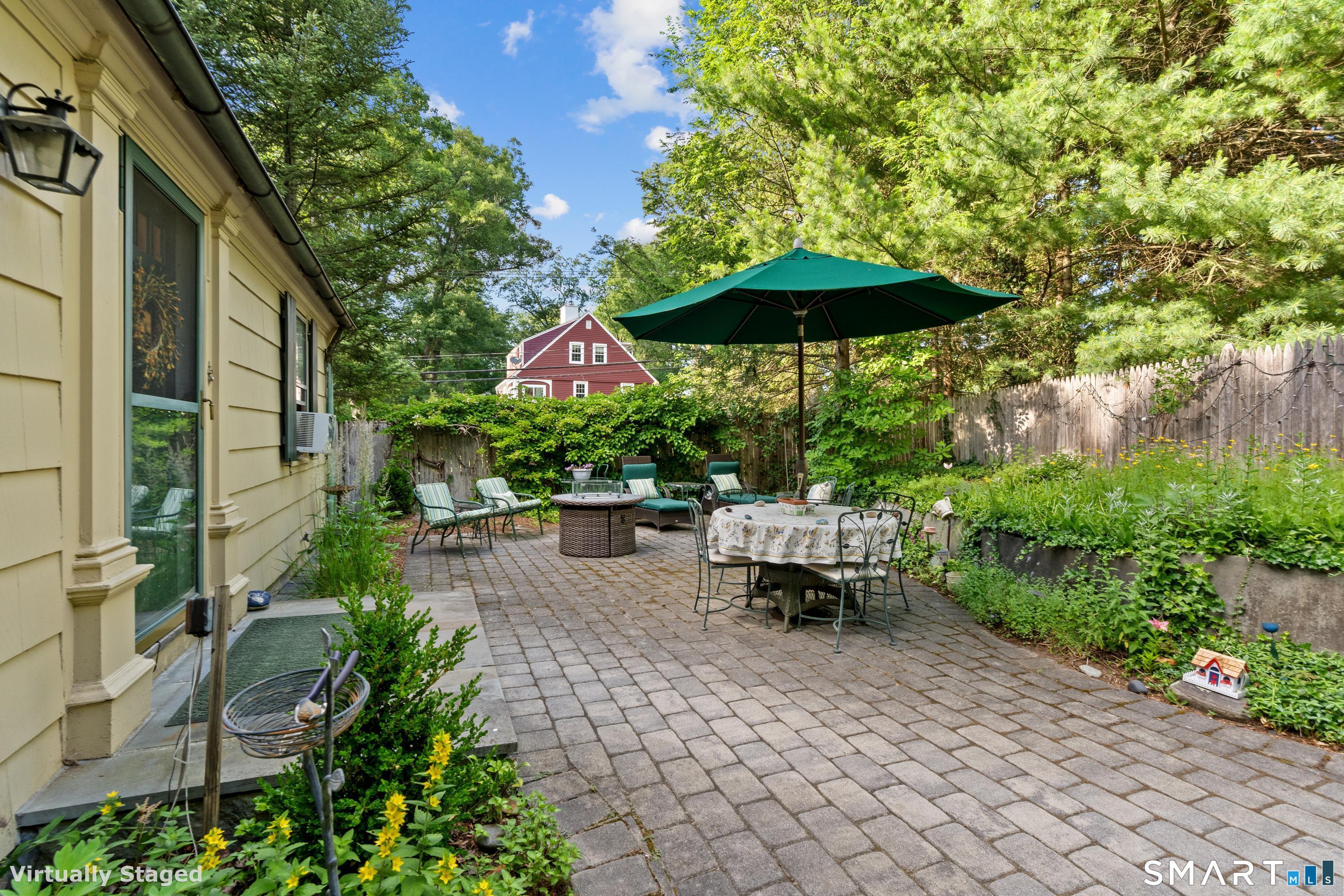 Image 3: Morning coffee, after dinner drinks, reading, al fresco dining; this patio is perfect for that and much more!