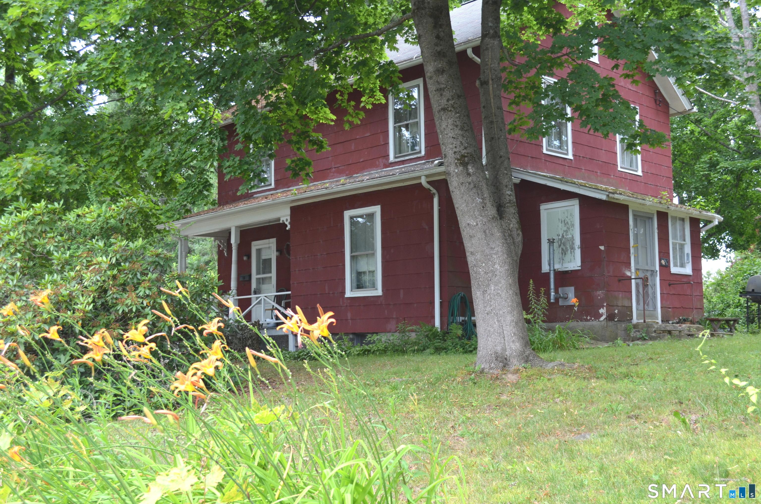 Image 2: HOUSE VIEW FROM ROAD-SIDE/BACK