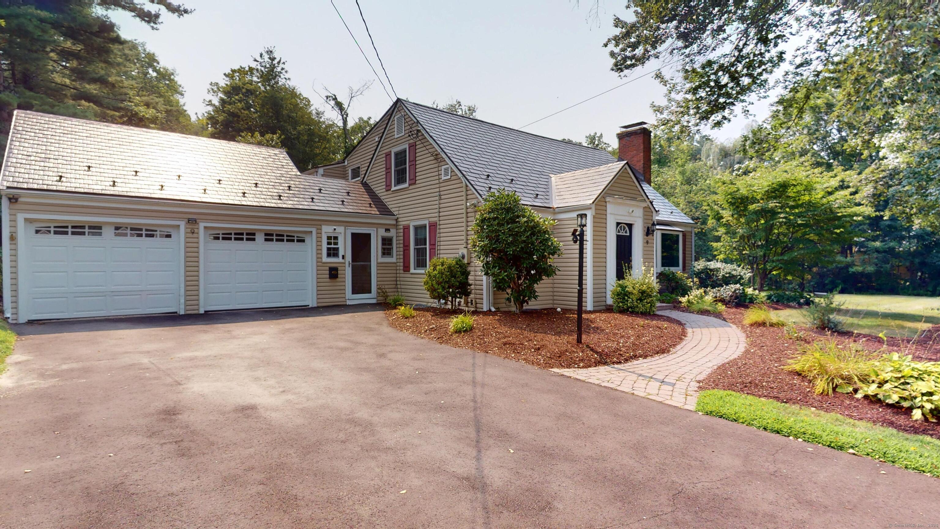 Image 2Front of House: An expanded Cape Style home in the heart of the Buena Vista neighborhood.