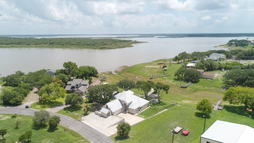 Image 3: LAKE CORPUS CHRISTI IS IN THE BACKGROUND.
