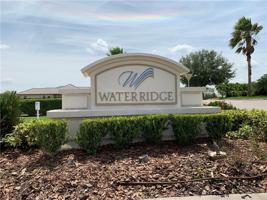 233 E SNOWY ORCHID WAY