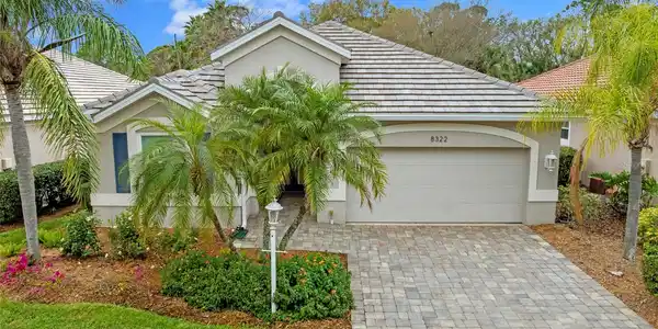 8322 WHISPERING WOODS COURT