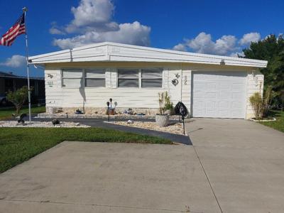 125 LAKE TARPON DRIVE