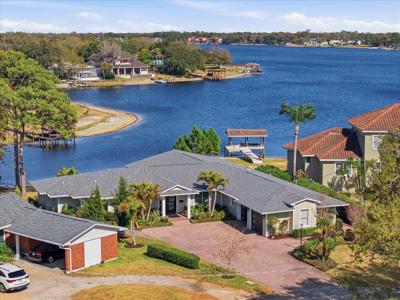 10705 CARROLLWOOD DRIVE