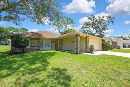 7103 CROWN OAKS DRIVE