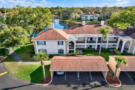 10330 CARROLLWOOD LANE