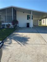 8569 BREEZE HILL DRIVE