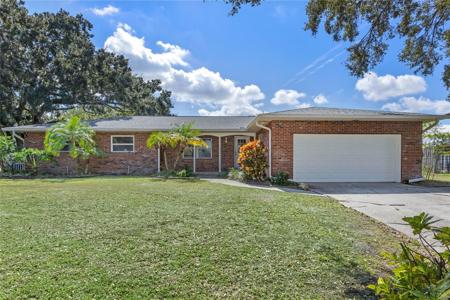 704 TANGELO COURT