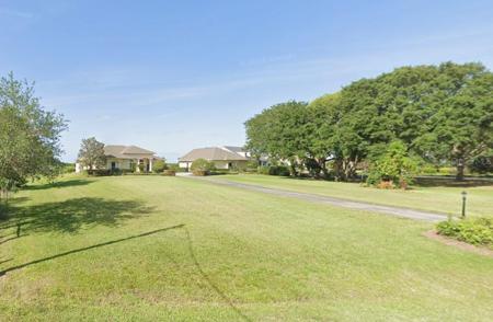 6027 LAKE LIZZIE DRIVE