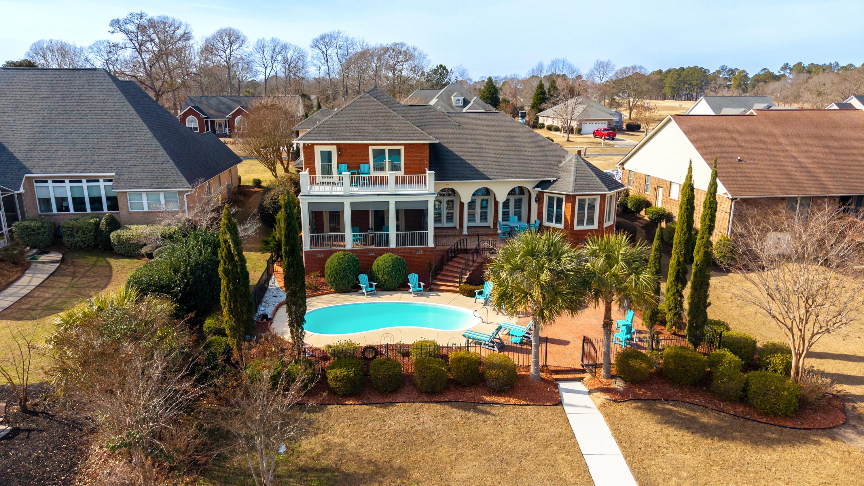 Image 2: AERIAL BACK OF HOME