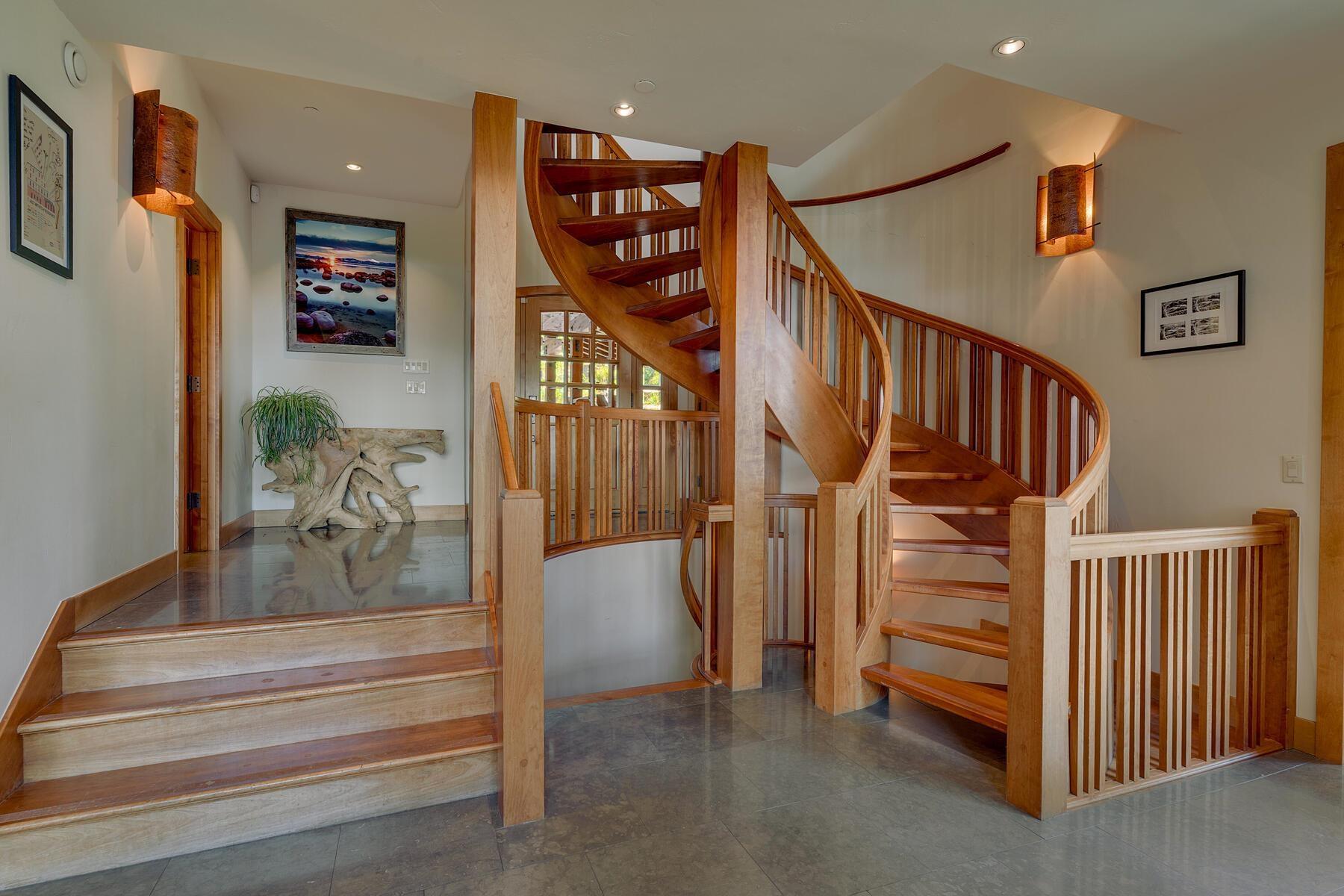 Image 4: There is a powder room just off the entry.