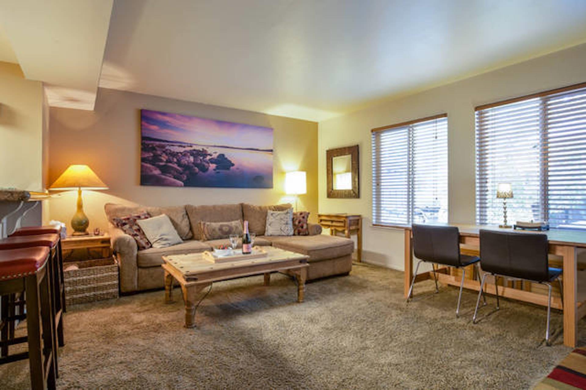 Image 0: Cozy? Yes. Cash-flowing? Also yes. The kind of living room where you Netflix and make money.