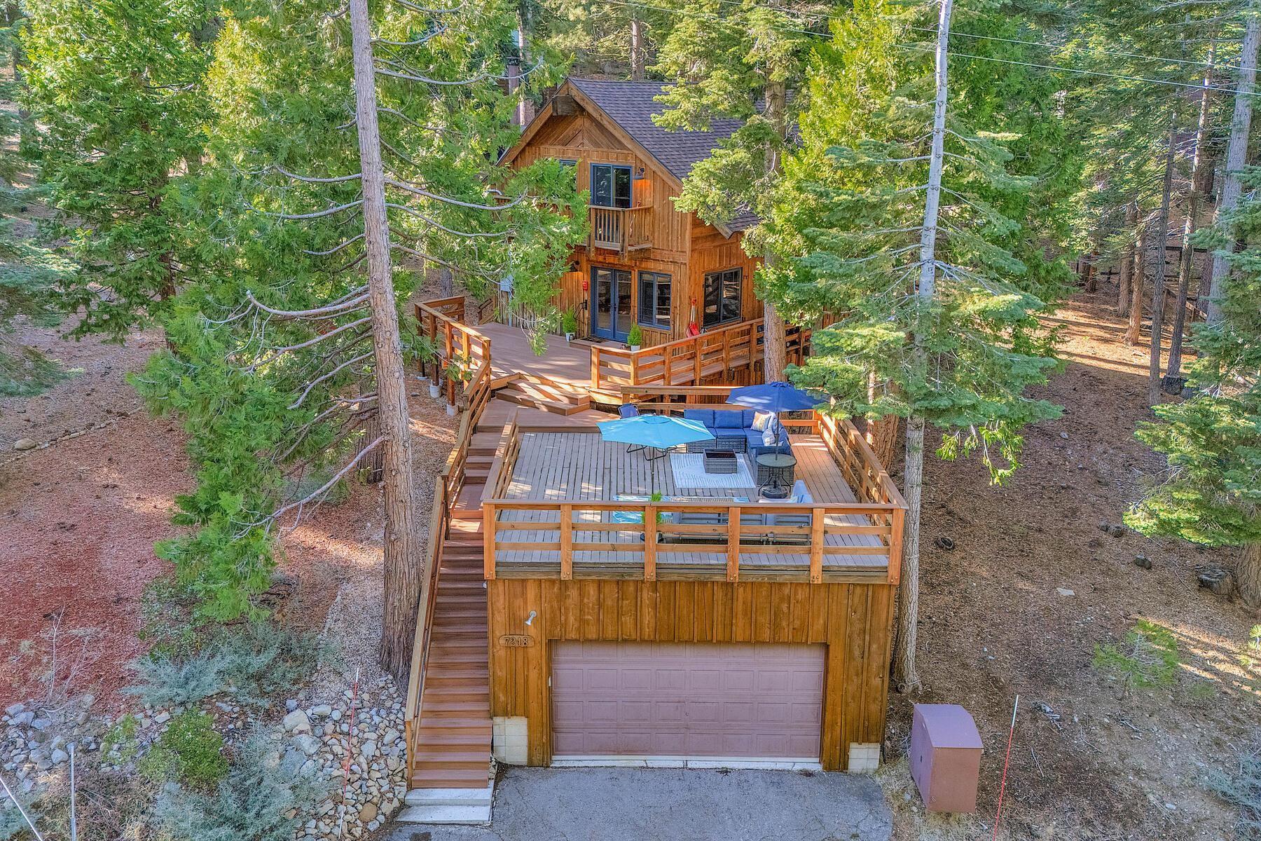 Image 0: Conservancy lot to the left and behind the property., Front of House