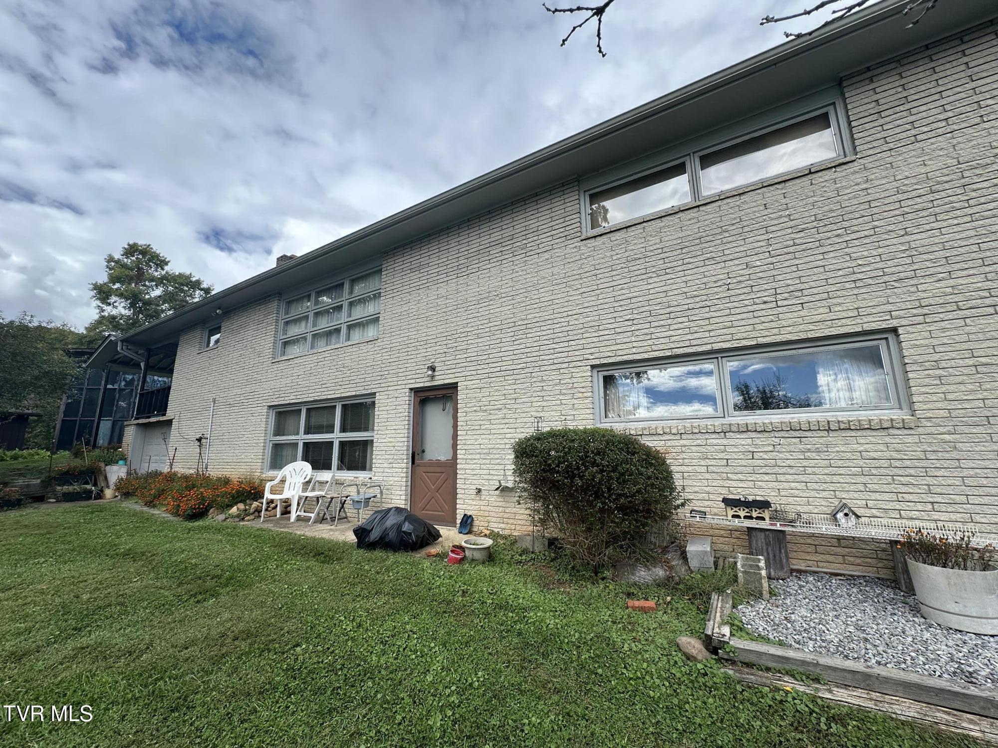 Image 3: ALL BRICK BACK HOME VIEW