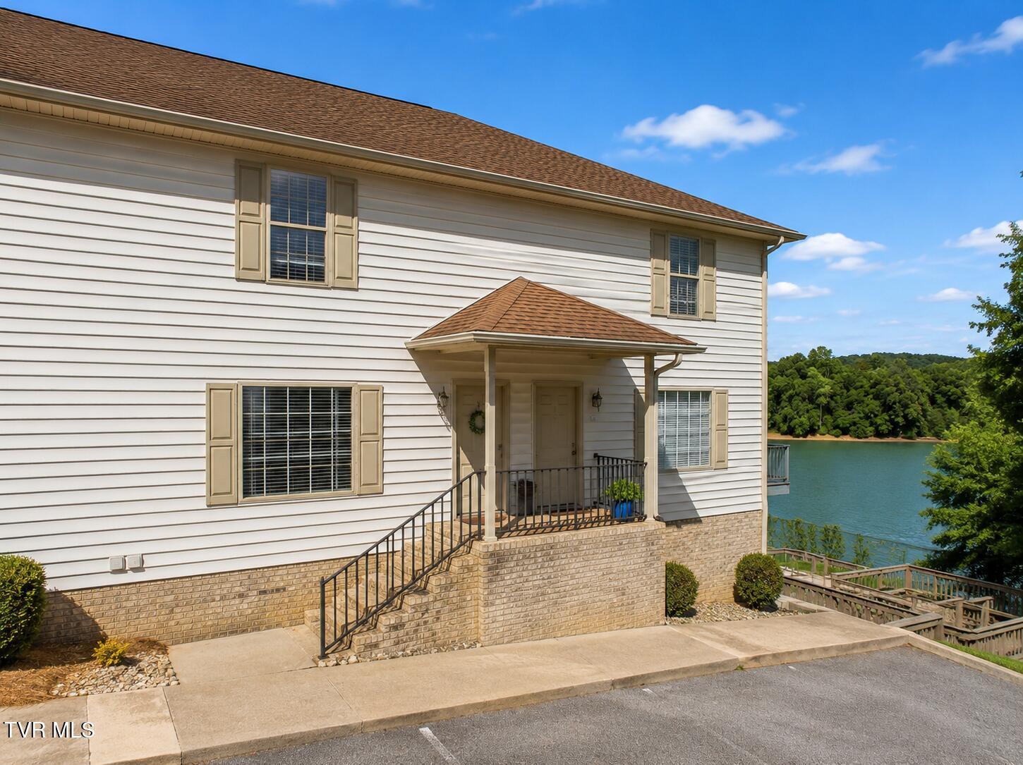 Image 1: Front Entryway with Lake Views