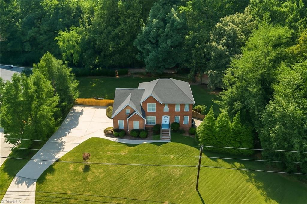 Image 3: Arial Photo (Roof is AI generated to match current roof color)