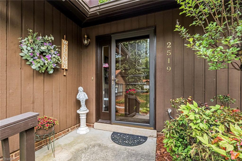 Image 4: Front entry with Pella storm door