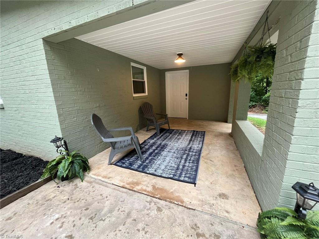 Image 4: Covered porch to sit and enjoy to views!
