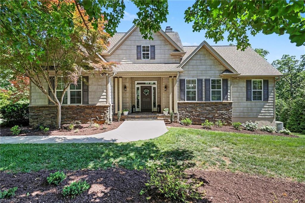 Image 1: Front of home with our Carolina blue sky