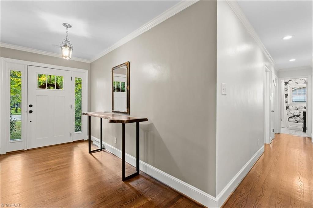 Image 4: Light Filled Front Foyer