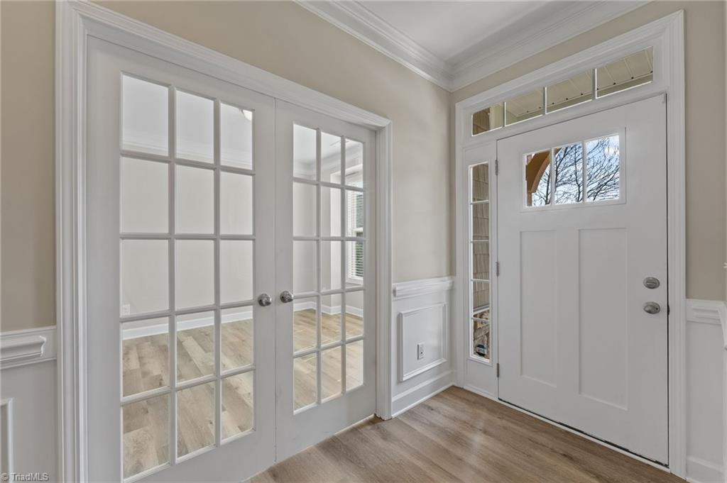 Image 3: Looking into the dedicated office with french doors closed.