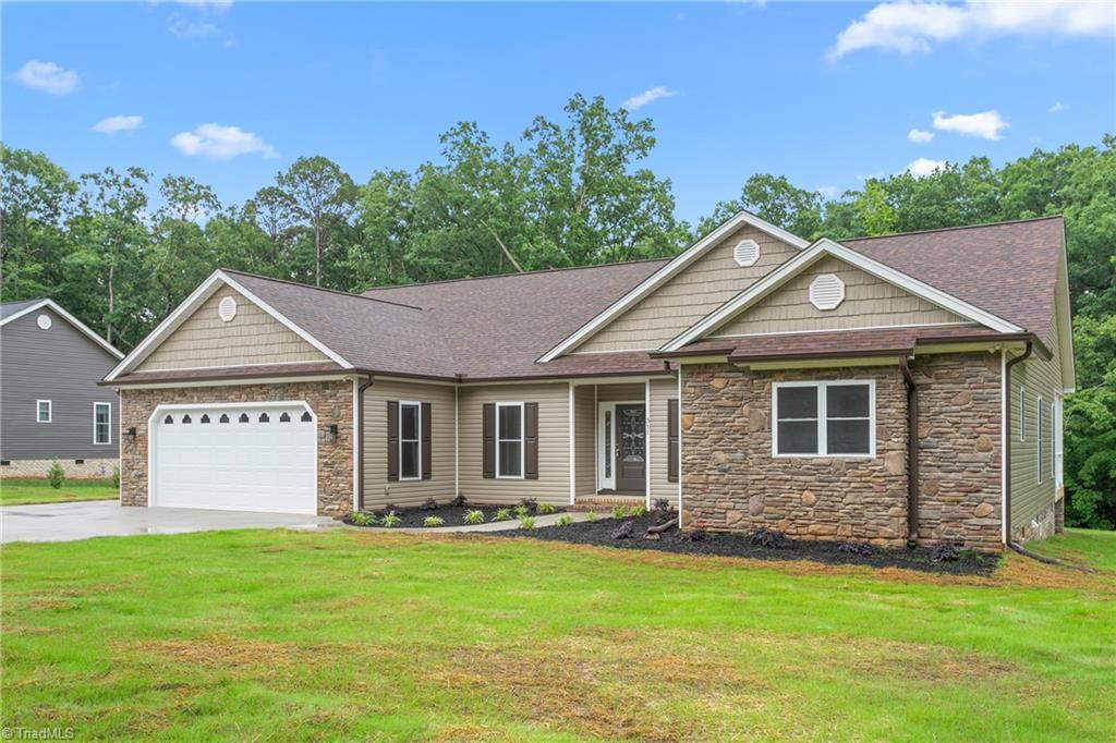 Image 2: Stone and Vinyl Exterior
