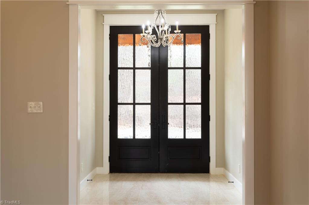 Image 4: The double doors create such a welcoming feel into an open floorplan