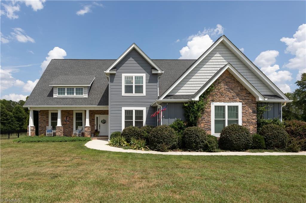 Image 1: This home has such a welcoming feel. Situated in a beautiful  community. Just wait until you step inside!