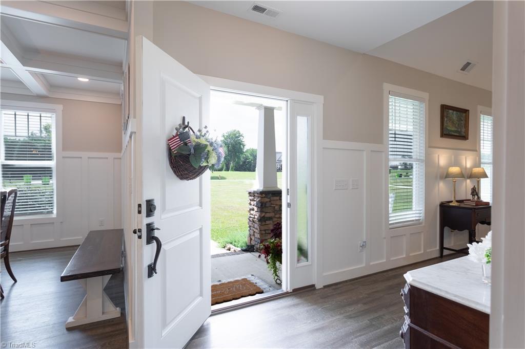 Image 4: Nothing says "welcome" like high ceilings, gorgeous millwork, and a neutral palette.