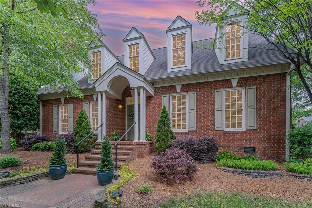 Image 1: Twilight shot of the home.