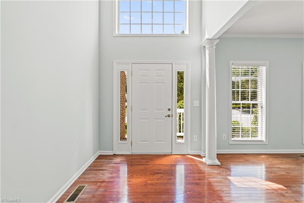 Image 3: Step inside to this light filled foyer.
