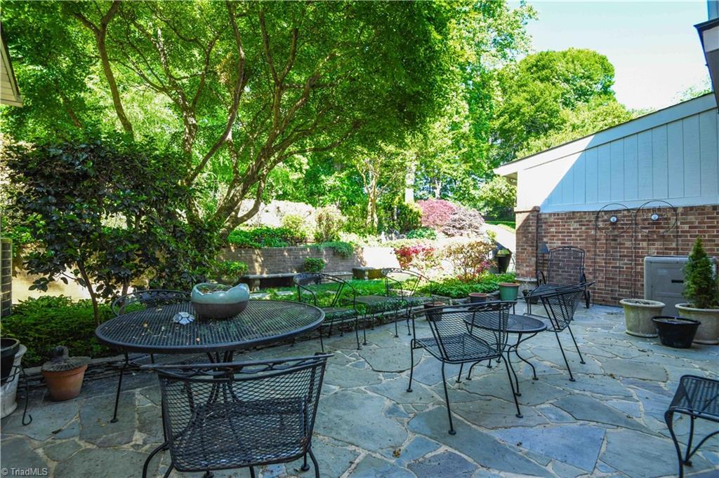 Image 3: Large slate patio in back