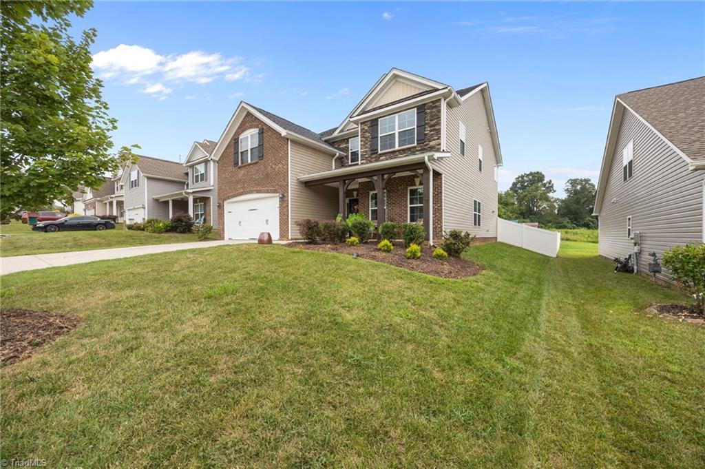 Image 1: Spa bath sanctuary, $7k custom fire pit, and a 12&times;14 storage building &mdash; this 5BR/3BA retreat offers 3,125 sq ft of style and function on a spacious .36-acre lot