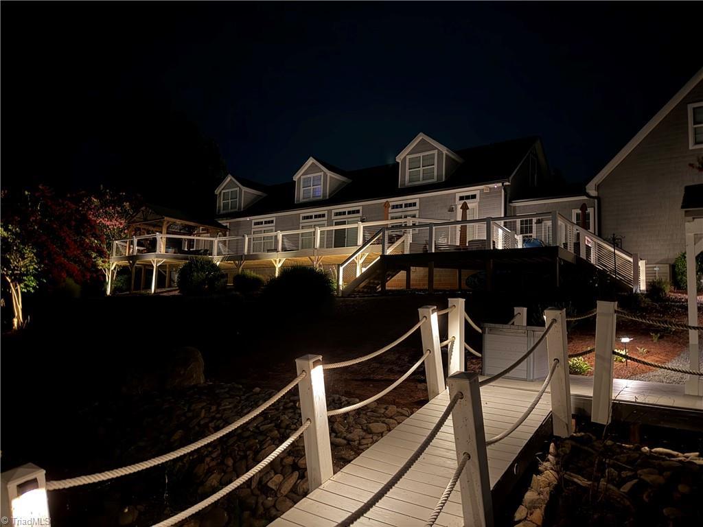 Image 2: Lighting sets the mood.  Take a night ride on lake and enjoy the the accent lighting as you walk into your lake home.