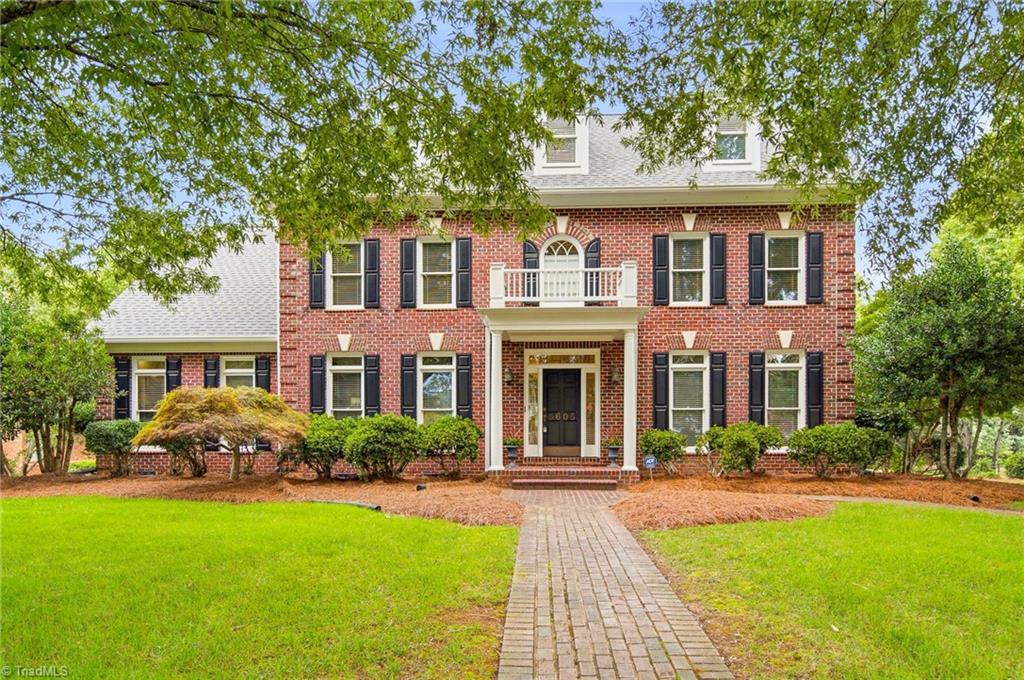 Image 2: Actual front view-All brick custom home